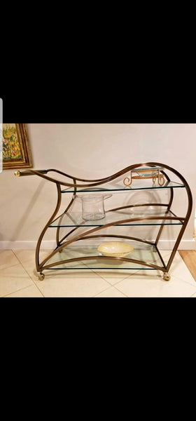 VINTAGE MID CENTURY MODERN HOLLYWOOD REGENCY DIA/ MILO BAUGHMAN SCULPTURAL METAL BRUSHED BRASS N GLASS SERVING/ TEA/ BAR CART ON CASTORS