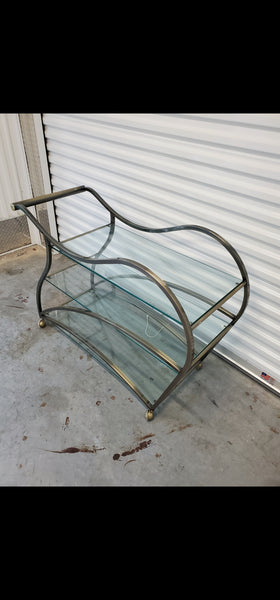 VINTAGE MID CENTURY MODERN HOLLYWOOD REGENCY DIA/ MILO BAUGHMAN SCULPTURAL METAL BRUSHED BRASS N GLASS SERVING/ TEA/ BAR CART ON CASTORS