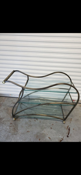 VINTAGE MID CENTURY MODERN HOLLYWOOD REGENCY DIA/ MILO BAUGHMAN SCULPTURAL METAL BRUSHED BRASS N GLASS SERVING/ TEA/ BAR CART ON CASTORS