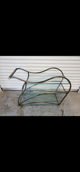 VINTAGE MID CENTURY MODERN HOLLYWOOD REGENCY DIA/ MILO BAUGHMAN SCULPTURAL METAL BRUSHED BRASS N GLASS SERVING/ TEA/ BAR CART ON CASTORS
