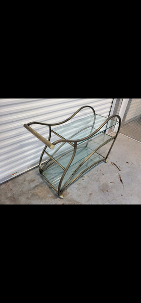 VINTAGE MID CENTURY MODERN HOLLYWOOD REGENCY DIA/ MILO BAUGHMAN SCULPTURAL METAL BRUSHED BRASS N GLASS SERVING/ TEA/ BAR CART ON CASTORS