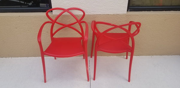 RED INJECTED POLYPROPYLENE SPACE AGE ACCENT CHAIRS (2)